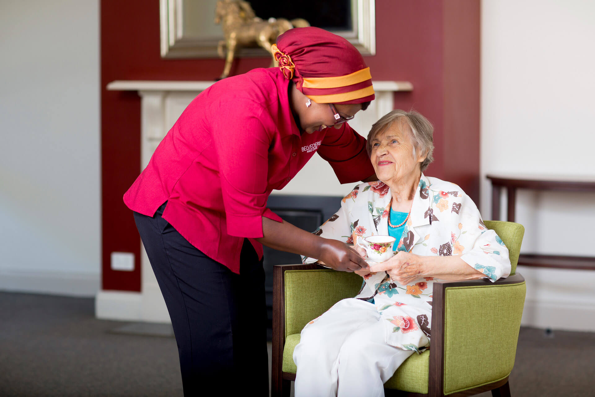 Aged care photographer Melbourne Melbourne aged care worker and client interacting