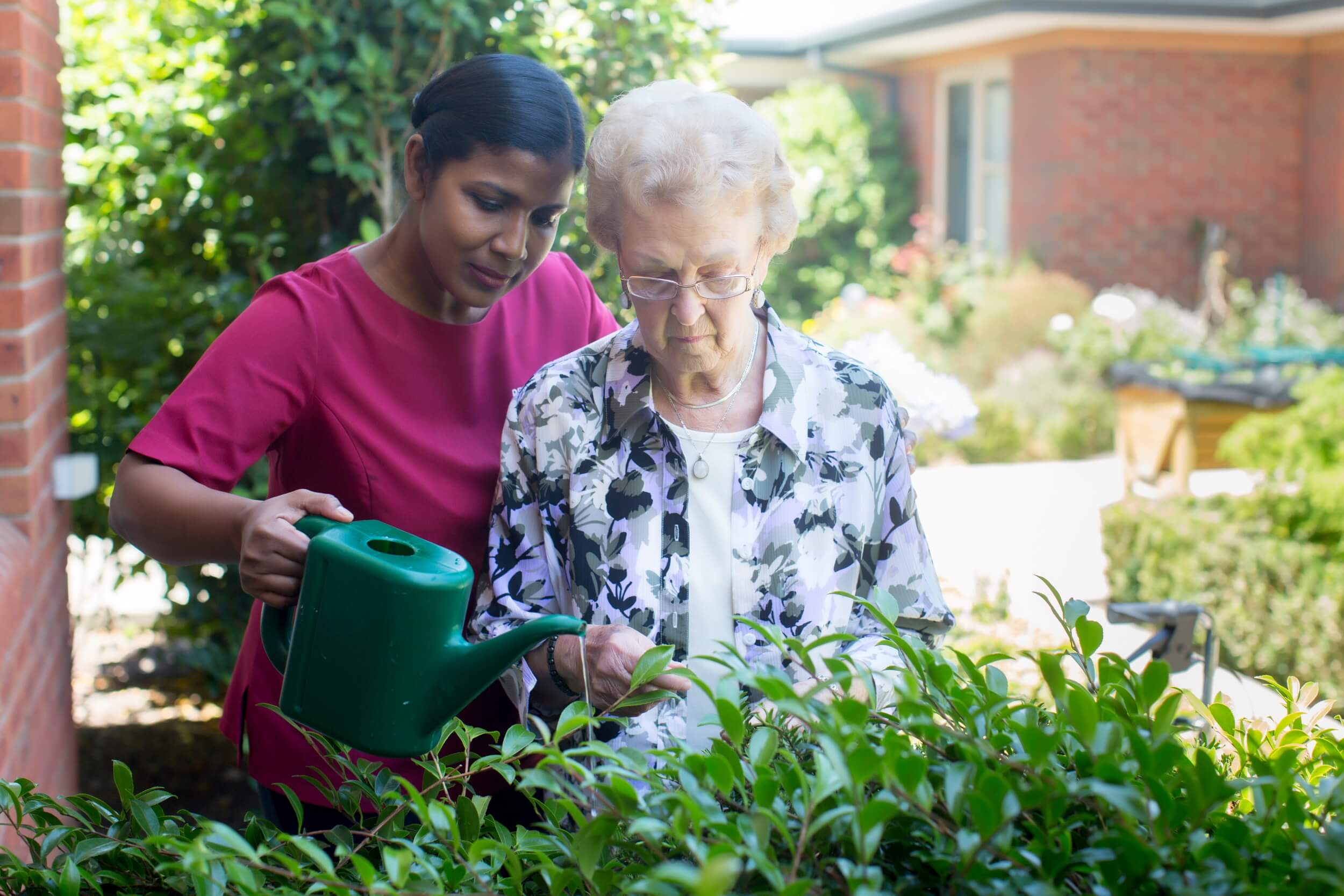 Professional photography of nurse and resident at aged care facility in Melbourne
