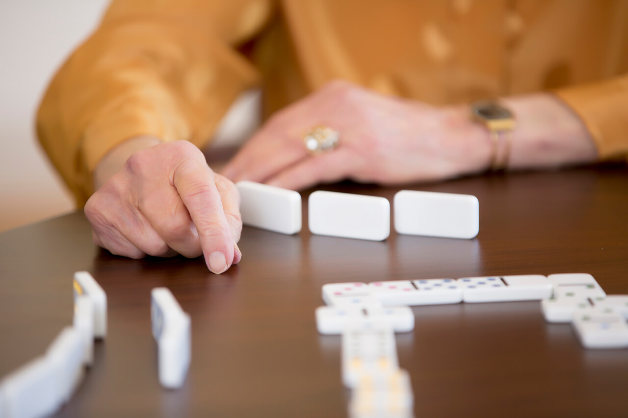 Resident playing game in aged care facility in Melbourne