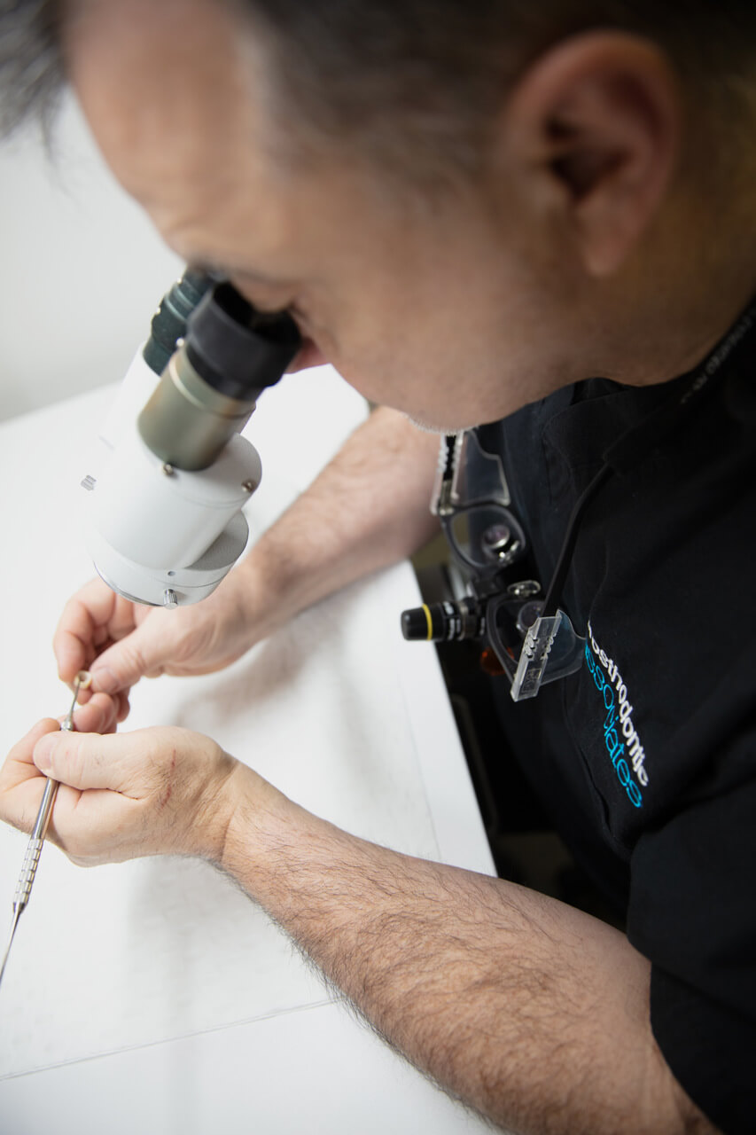 medical marketing photographer for clinics Close up of dental professional working in Melbourne