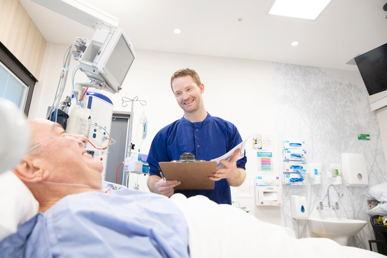 Hospital ward Professional photography in hospital of nurse with patient in a ward