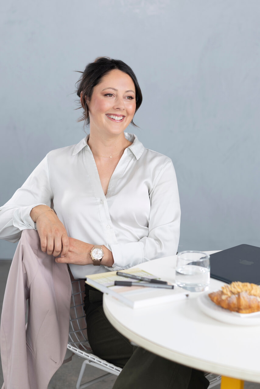 Relaxed portrait for branding of a consultant looking off camera